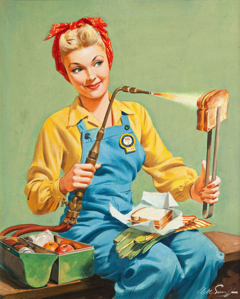 A blonde woman with red headscarf and denim overalls toasts a sandwich with her welding torch, her green lunch box on the bench next to her.